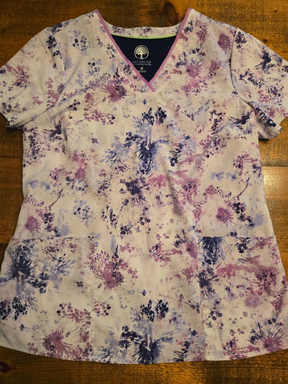 Healing Hands womens scrub top, size medium, dandelion burst design.